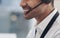 Headset, mouth and man consultant in a call center for customer service closeup while talking on a call. Smile, support