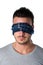 Headshot of blindfolded young man