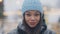 Headshot of gorgeous young African American woman with brown eyes looking at camera smiling. Close-up of confident