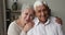 Headshot portrait affectionate retired wife hug shoulders of beloved husband