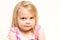 Headshot Portrait of Beautiful Toddler Girl with Mischevious Expression