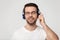 Headshot portrait guy wearing headphones enjoy music studio shot