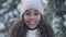 Headshot portrait of joyful smiling African American beautiful teen girl posing outdoors on winter day. Close-up face of