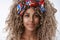 Headshot sincere, carefree attractive blond curly african-american woman in stylish headband, piercing, smiling with