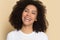 Headshot of smiling african American girl posing in studio