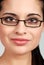 Headshot spanish woman wearing glasses
