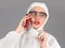 Headshot of woman in white protective suit of