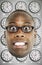 Headshot of worried man wearing glasses with various time zone clocks in background