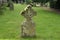 Headstone with a celtic cross in a cemetery.