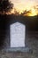 Headstone at sunset