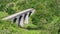 Headstone Viaduct or bridge over River Wye in summer