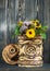 Healing herbs and flowers for herbal tea on a wooden background in a birch bark box.