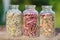 Healing herbs in glass bottles, herbal medicine