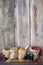 Healing herbs in hessian bags on old wooden background