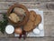 Health benefits of boiled potatoes, potatoes in the skin in a clay pot on a natural wooden background with natural simple picnic