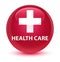 Health care (plus sign) glassy pink round button