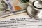 Health claim form with stethoscope and US dollar banknotes, insurance accident medical concept