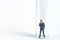 Health conceptual miniature people photography â€“ testing specimen, a businessman on a laboratory tube