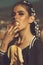 Health and diet, healthy dieting. Cute woman with stylish makeup eating vitamin banana