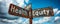 Health Equity written in white on a weathered black street sign against a dynamic sky with contrasting clouds