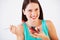 Health, happy and portrait of woman with fruit salad eating for nutrition, wellness and berry snack in studio. Food