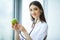 Health. Healthy Diet. Doctor Dietitian Holding in Hands Fresh Gr