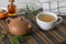 Health natural sea buckthorn tea with honey on a table with teapot