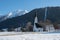 Health resort pertisau, austria. village church and ski lift to