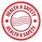 HEALTH & SAFETY text written on red round postal stamp sign