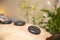 Health spa relaxing stone therapy with hot volcanic stones on back