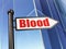 Healthcare concept: sign Blood on Building background