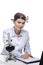Healthcare Concepts. Professional Laboratory Female Researcher in Smock Working With Microscope While Conducting a Research and