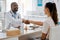 Healthcare, insurance and handshake between a doctor and patient consulting in an office, discussing a treatment plan