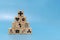 Healthcare. medical icon on wooden cube block pyramid stack on blue background