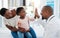 Healthcare, mother and girl gives doctor high five in a doctors office. Medical insurance, healthy child development and