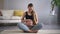 Healthcare and prenatal yoga womanSpbd strokes tummy on floor