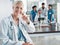 Healthcare, smile and leadership, portrait of woman doctor at desk in hospital for support, teaching and medical