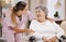 Healthcare, support and caregiver with senior woman for medical help, elderly care and consulting patient. Wheelchair