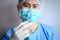 Healthcare worker holding a syringe before injection vaccine or medicine to patients.