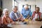 Healthcare worker serving coffee to senior people