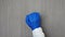 The healthcare worker is trying to reach out to the patient. The doctor knocks on the door, a man`s brush in a medical glove knock