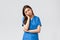 Healthcare workers, prevent virus, insurance and medicine concept. Exhausted and sleepy female nurse, doctor in scrubs