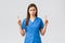 Healthcare workers, prevent virus, insurance and medicine concept. Upset sobbing cute nurse or doctor in blue scrubs