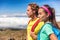 Healthy active people lifestyle couple hiking in nature outdoors. Interracial couple Asian woman, caucasian man portrait. Hikers