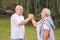 Healthy aged couple resting after sport exercises- together we w