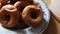 Healthy alternative of fried food showing close up shot of Baked donut shaped Medhu Vada, Chili Pakora. Delicious south Indian