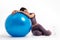 Healthy Asian woman Rest over by lying on the ball after a workout with fitball on isolated white background, Concept of good