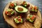 Healthy Avocado and cherry tomato rye sourdough toasts with pumpkin, sesame and nigella seeds, drizzled with olive oil