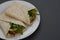 Healthy avocado and vegetables burrito, wraps, rolles. Healthy breakfast or snack. Avocado sandwich. Copy space