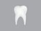 A healthy back and white tooth for dentists on dark background